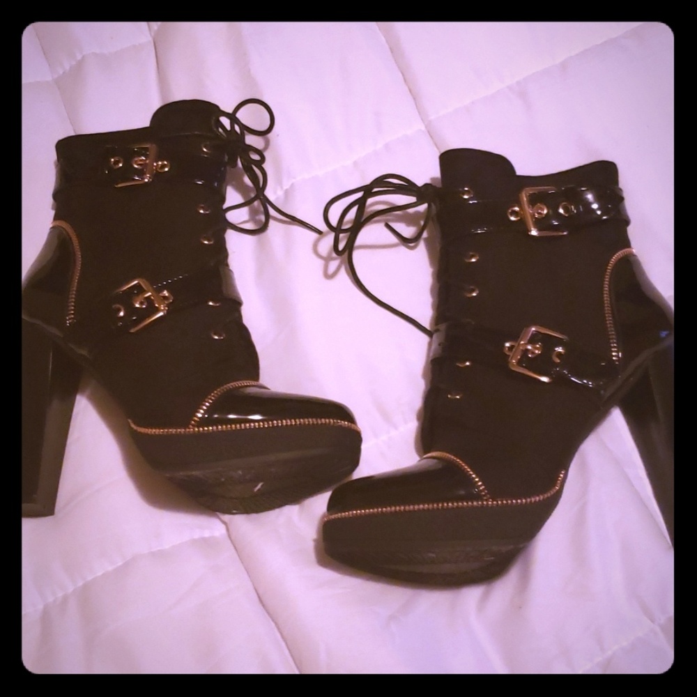Never worn heeled boots size 7.5 comes with box